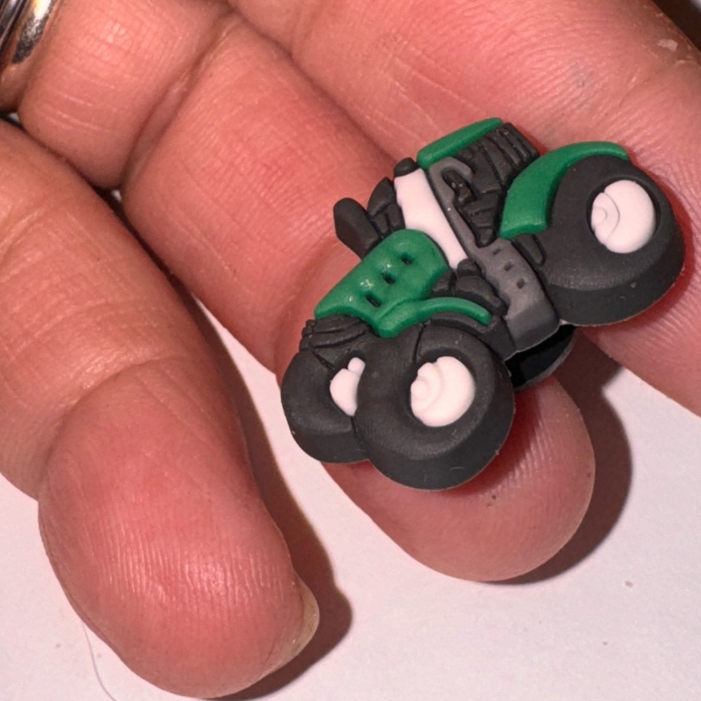 Brand new off brand truck crocs charm. See details to bundle 3 for $12!